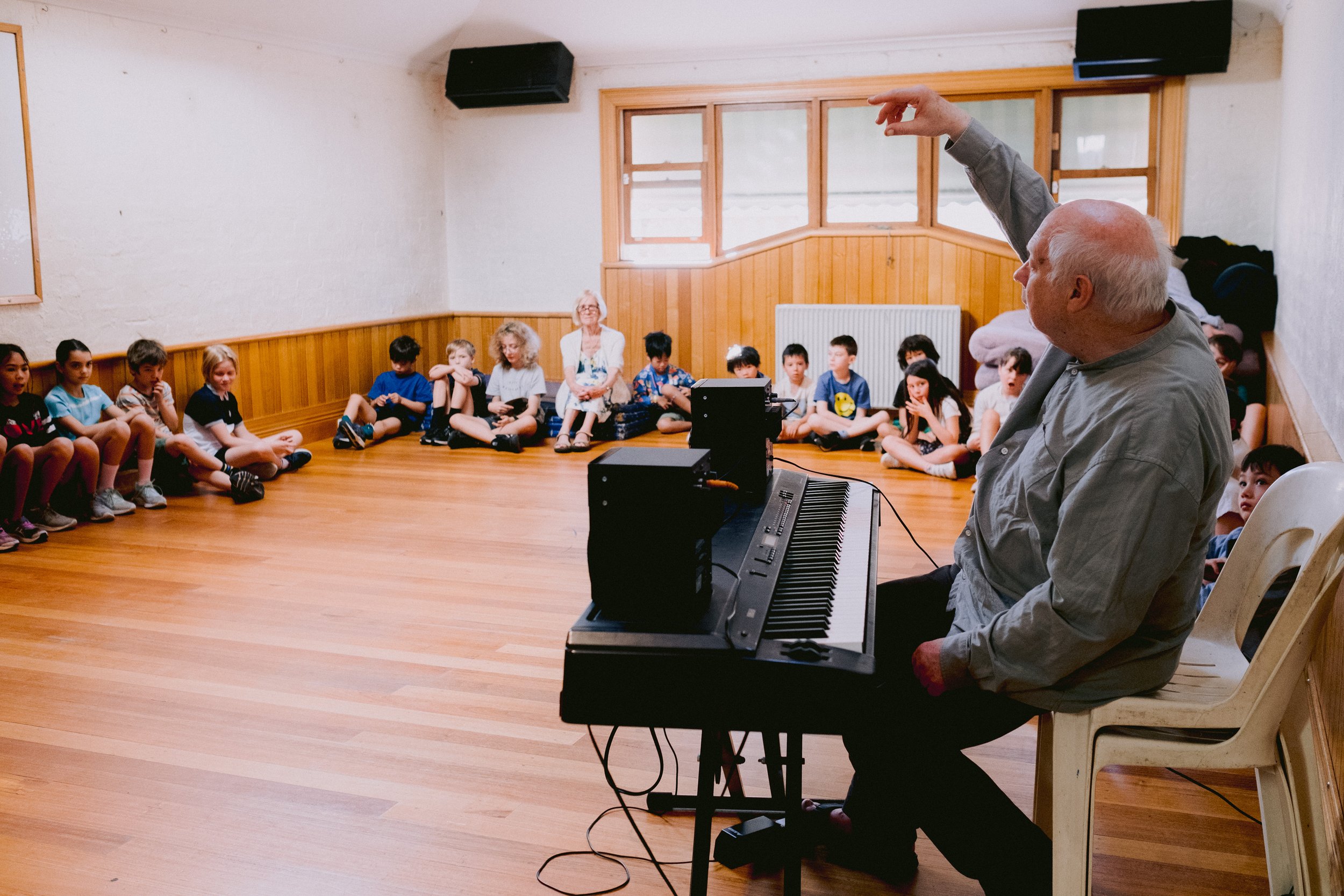 Man at keyboard in clas