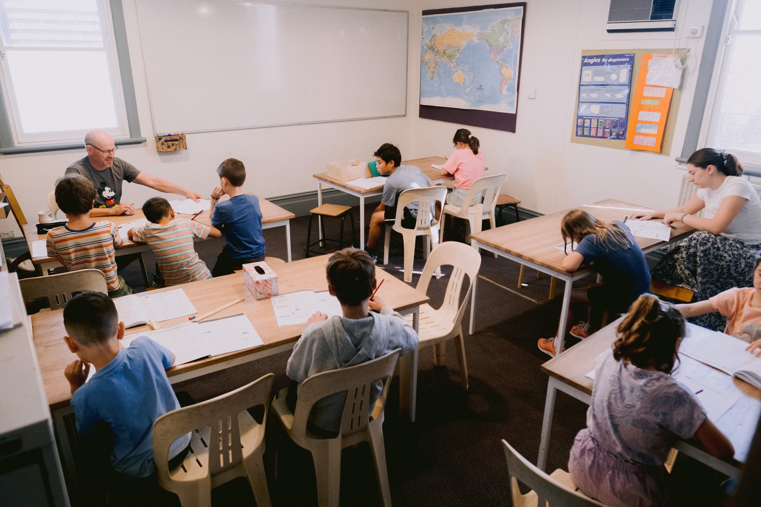 Teacher and Pupils, Pencils Out in Class