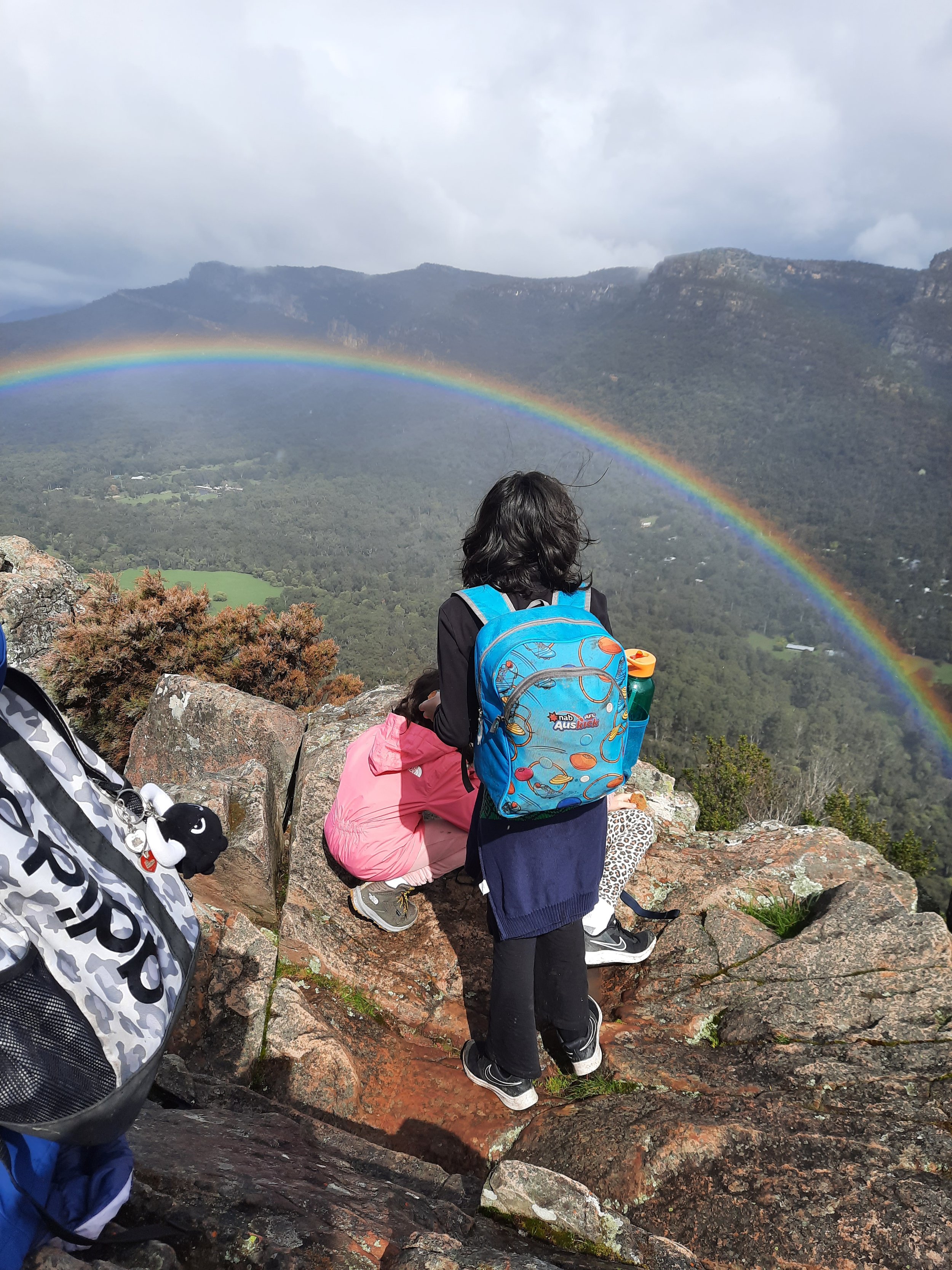 view over mountains with rainbow